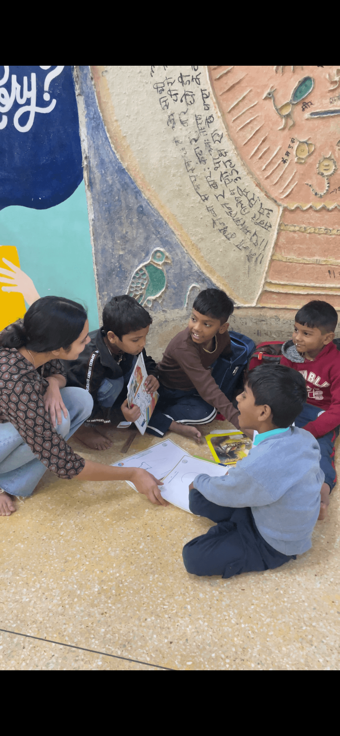 Children gathered in a reading and reflection circle